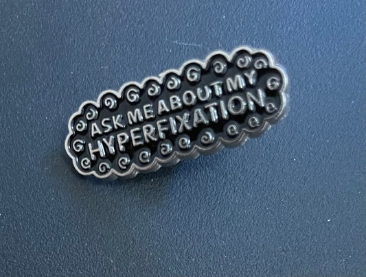 Hyperfixation Enamel pin